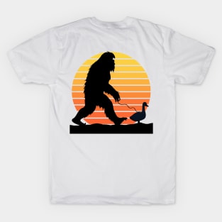 Bigfoot walking a duck on a leash T-Shirt